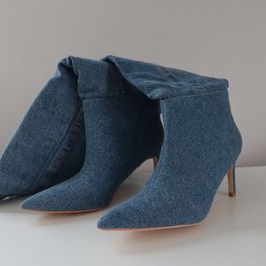 Tall denim boots